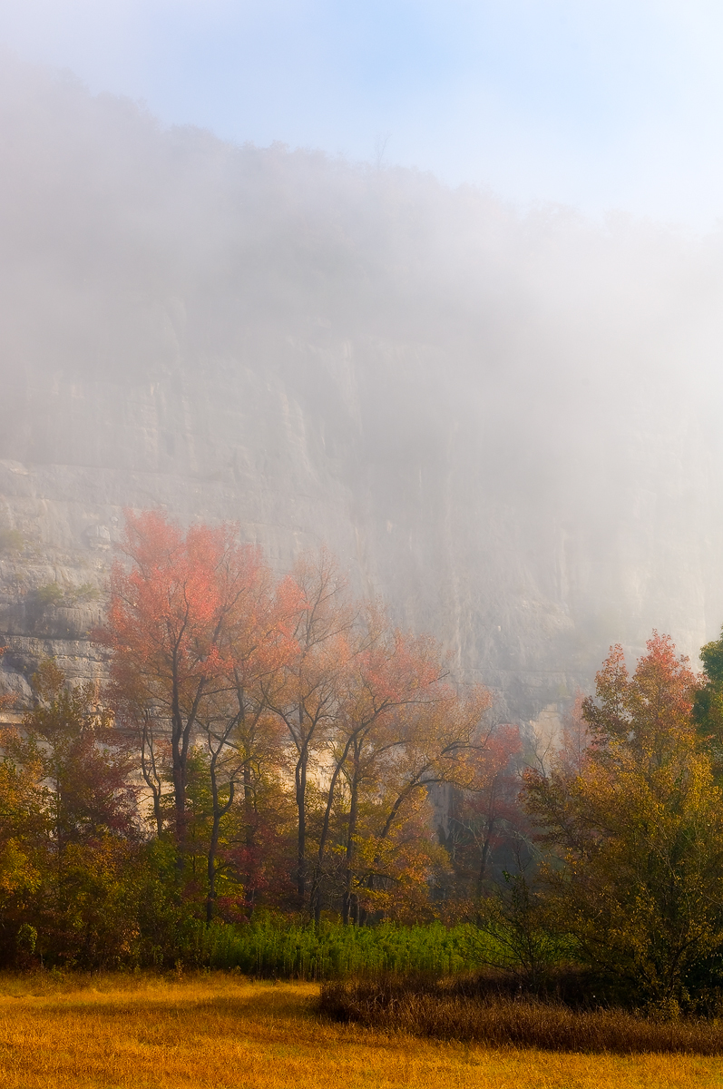 Morning fog lifts above the water along the Buffalo River.