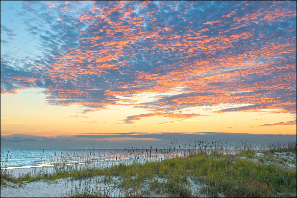 A pastel winter sunset along Gulf Shores, Alabama.